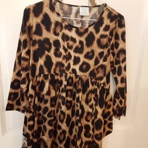 Shop the Mint animal print tunic. Medium